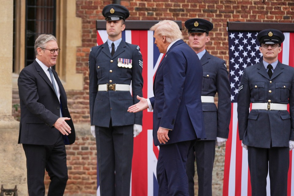 President Donald Trump shakes hands with Britain's Prime Minister Keir Starmer.