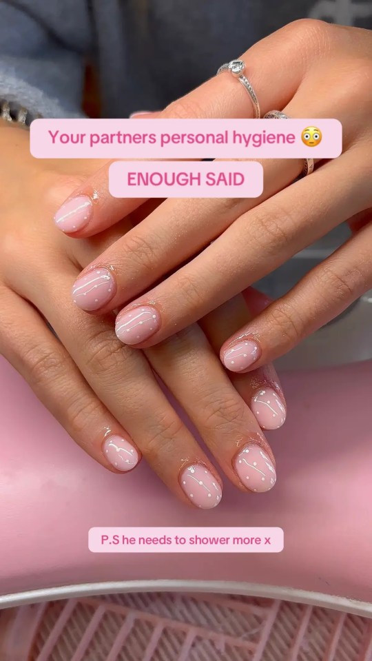 Hands with pink nails with white dots and lines and text that reads "Your partners personal hygiene. ENOUGH SAID. P.S he needs to shower more x".
