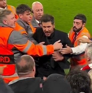Stewards had to restrain the feisty Argentine in heated scenes