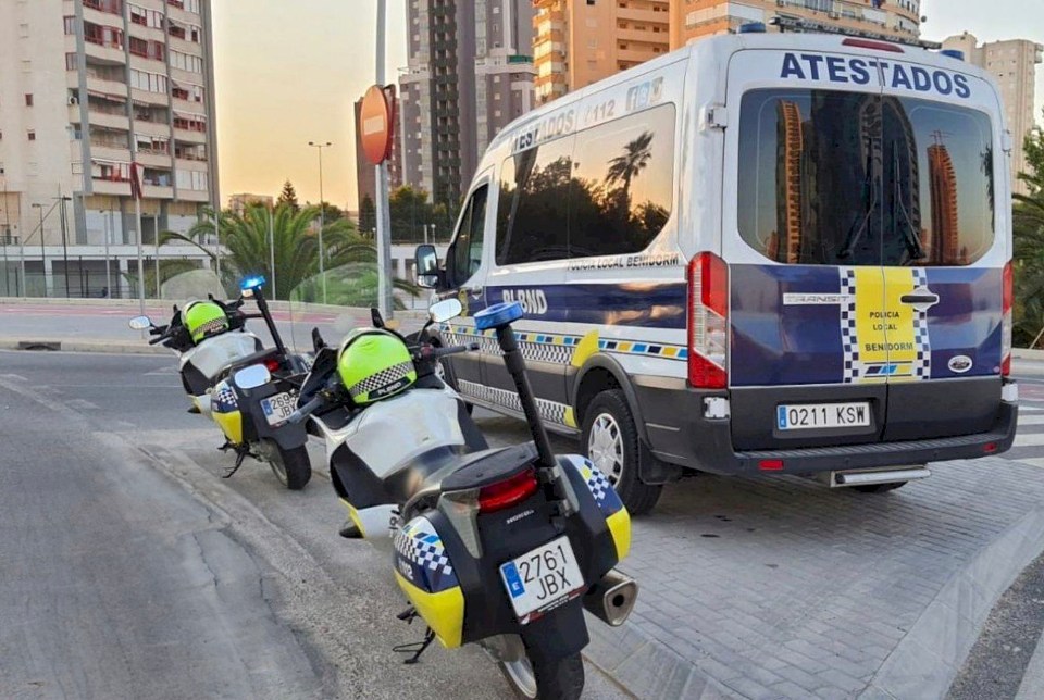 Benidorm Local Police van and two police motorcycles.