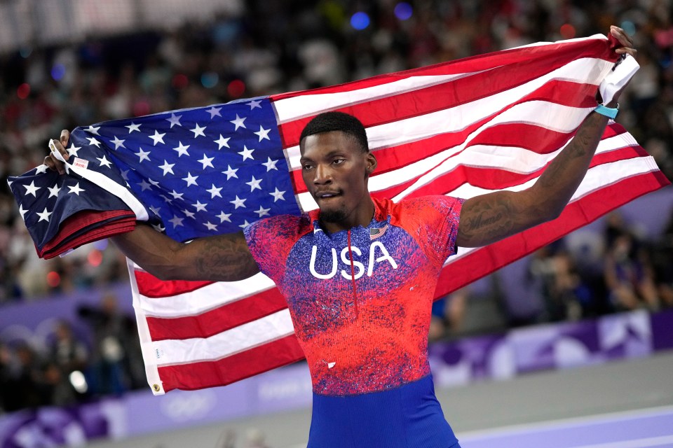 Fred Kerley celebrating after his third-place finish in the men's 100-meter final at the 2024 Summer Olympics.
