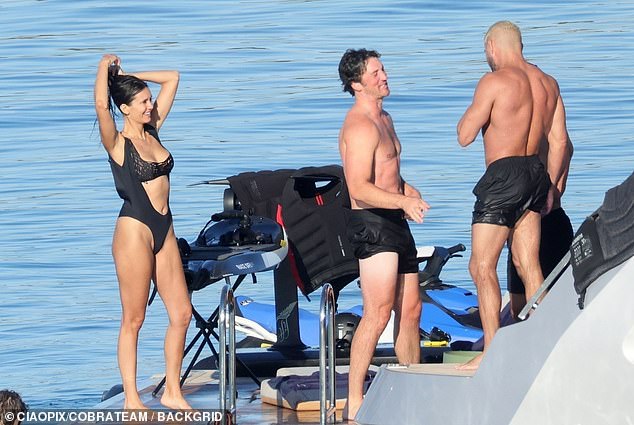 The daring look featured cheeky cutouts and a high-leg silhouette that displayed her gym-honed physique