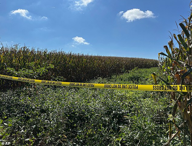 As the investigation continued Wednesday night, more than 30 police vehicles were seen blocking off roads bordered by a barn, a goat farm as well as soybean and corn fields