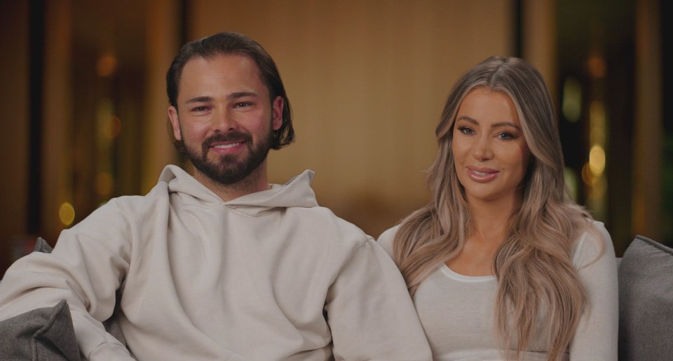 Bradley Dack and Olivia Attwood smiling for the cameras on the "Olivia Marries Her Match" TV show.