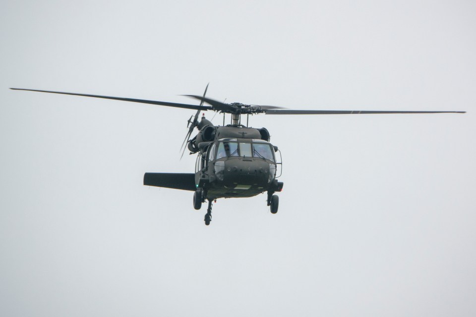 A U.S. Army Sikorsky UH-60L Black Hawk helicopter in flight.