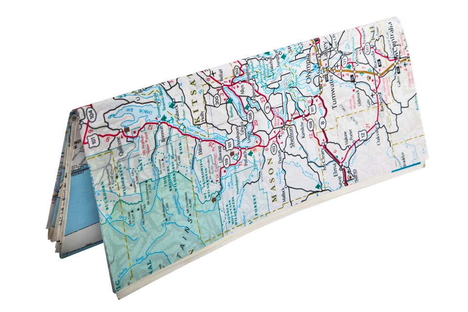 A folded map, displaying the area of Olympia, Washington.