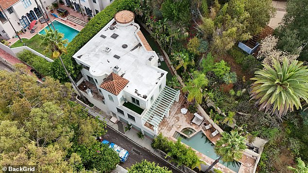 Police raided the singer's house searching for blood evidence late Wednesday