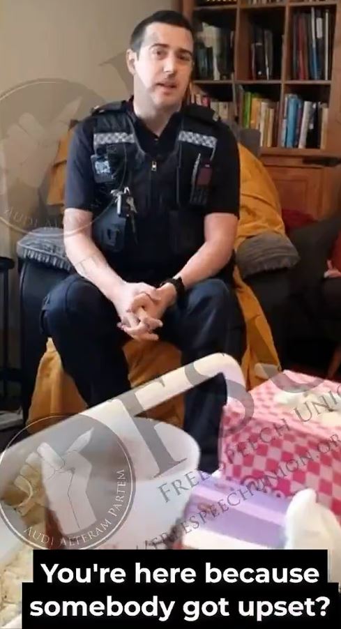 Thames Valley Police has come under fire after one of its officers was sent to question an American woman over claims she had made a 'threatening' post online , ,