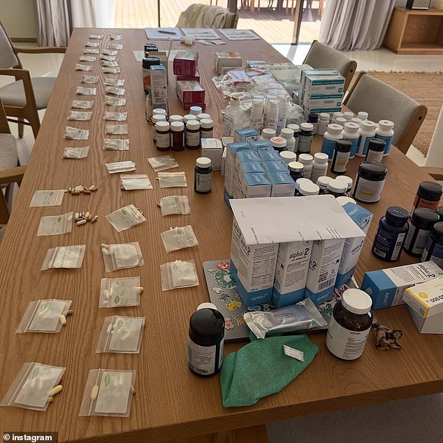Pills in small plastic bags could be seen laid out on a wood table