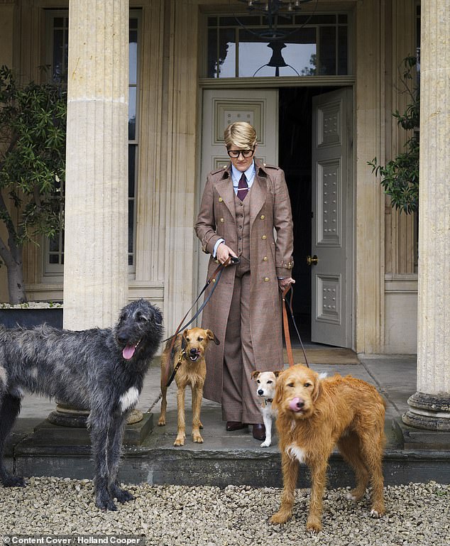 Clare, 54, wowed in a brown suit and matching long coat as she was snapped walking four dogs