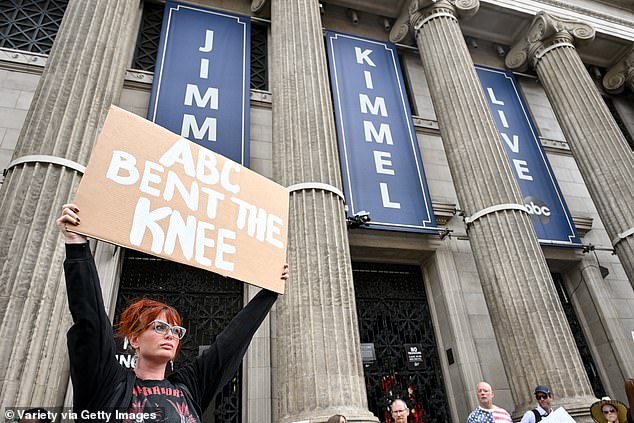 Several protest signs condemned ABC's decision to pull Kimmel off air