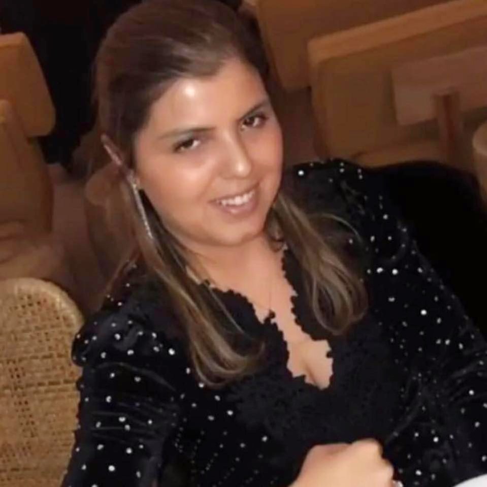 Marissa Laimos wearing a black top with white polka dots.