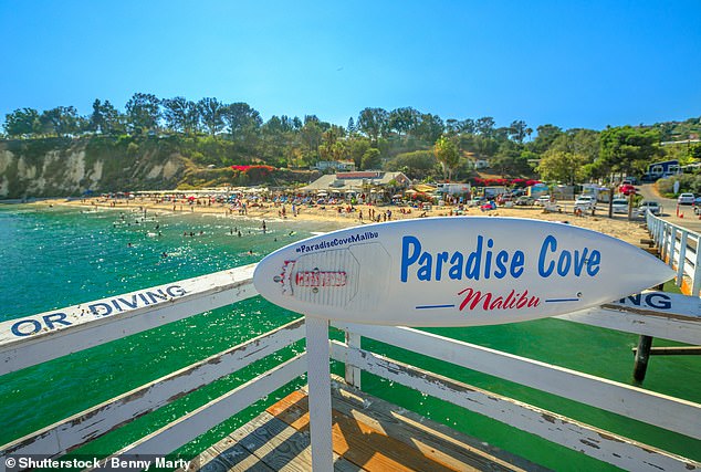 The beach in Paradise Cove is popular with families