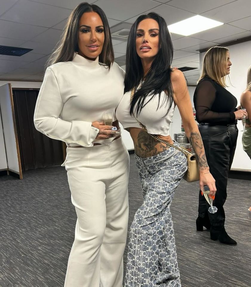 Katie Price and Lou Roy posing together with drinks.