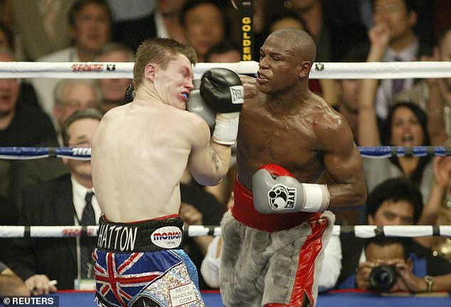 Hatton takes a blow from Floyd Mayweather during their 2007 title fight in Las Vegas
