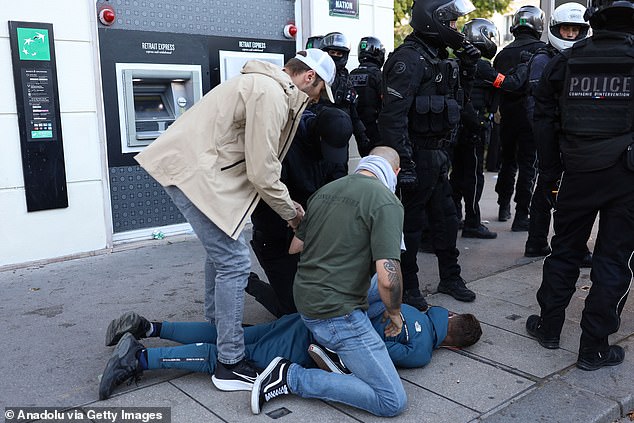 olice officers intervene the protesters during ongoing strikes and protests across the country in Paris, France on September 18, 2025