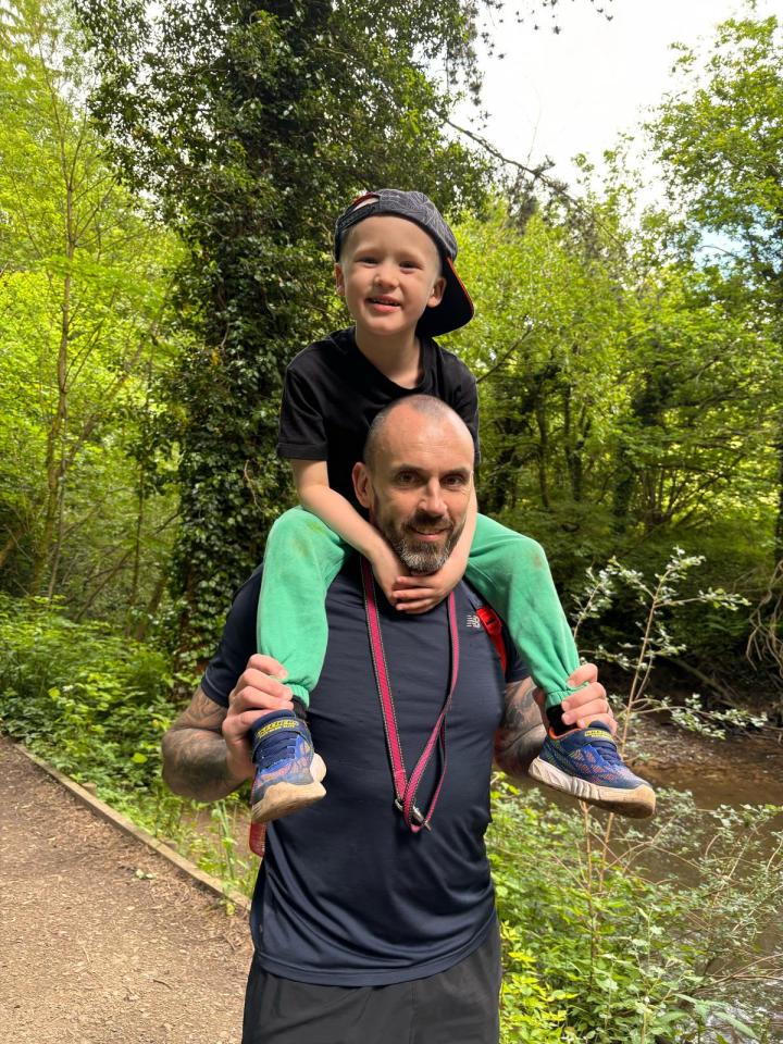 Tommy Verbickas on his father Darius' shoulders.