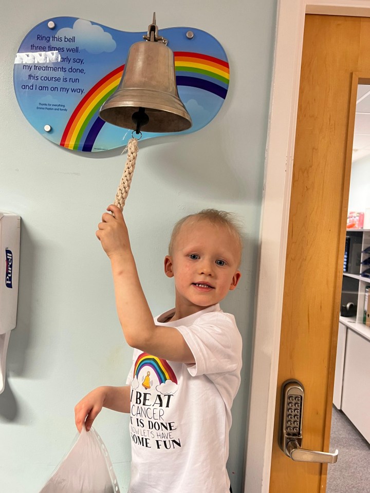 A young boy, Tommy, rings a bell that marks the end of his cancer treatment.