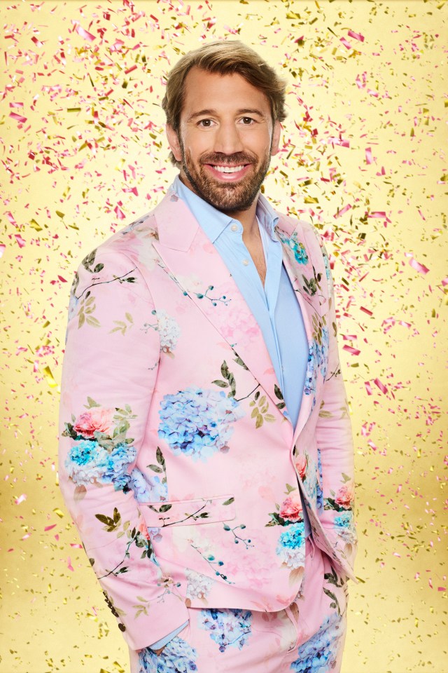 Chris Robshaw, smiling in a pink floral suit, on Strictly Come Dancing.