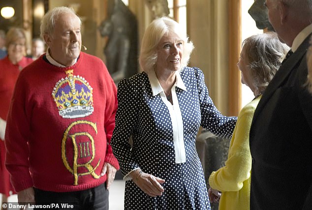 Queen Camilla with Gyles Brandreth (left) at a reception for literary figures during The Queen's Reading Room Festival