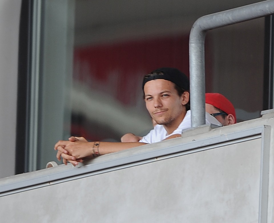 Louis Tomlinson watches Doncaster Rovers playing Sheffield Wednesday.