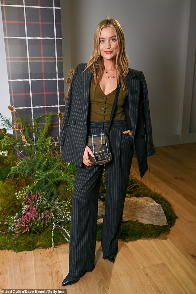 Earlier at a Barbour event, Laura served a more subtle look, though still sizzled in a black stripped suit with an oversized blazer she wore over her shoulders