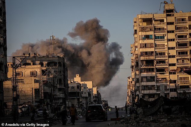 Thick smoke rises from the area after the Israeli army launched intense attacks on residential areas and multi-story buildings where thousands of displaced Palestinians had taken refuge on al-Jalaa Street in Gaza City, Gaza, on September 19, 2025