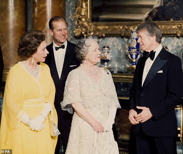 Pictured: President Jimmy Carter speaking with Her Majesties The Queen and the Queen Mother in the Blue Drawing Room at Buckingham Palace during the visit in May 1977