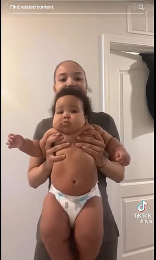 Mum Tyla shows off her four-month-old infant