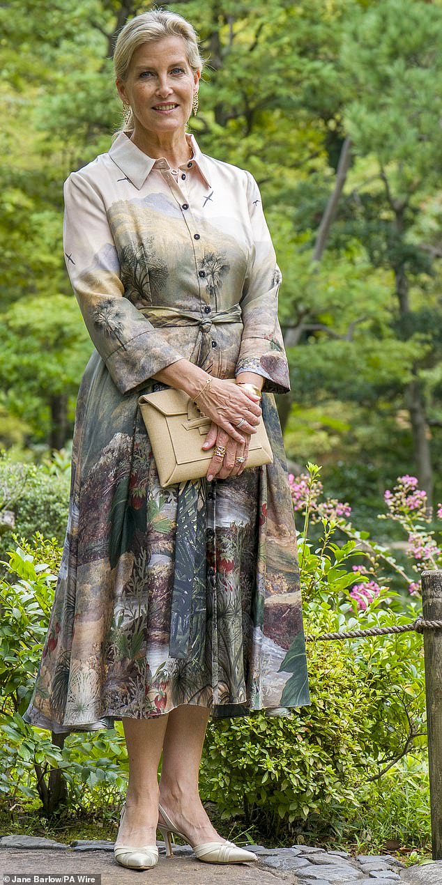 The Duchess (pictured in the gardens of the Nezu Museum in Minato City in Tokyo), donned a silk print dress for her engagements on day two of her Japan tour
