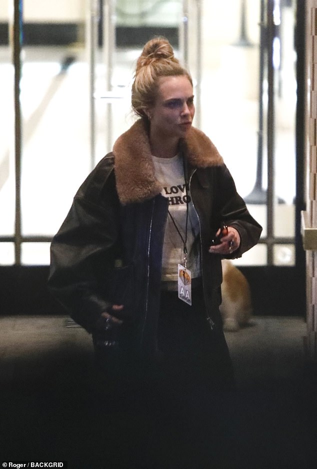 Cara cut a casual figure as she was spotted partying with palls in West Hollywood on Thursday
