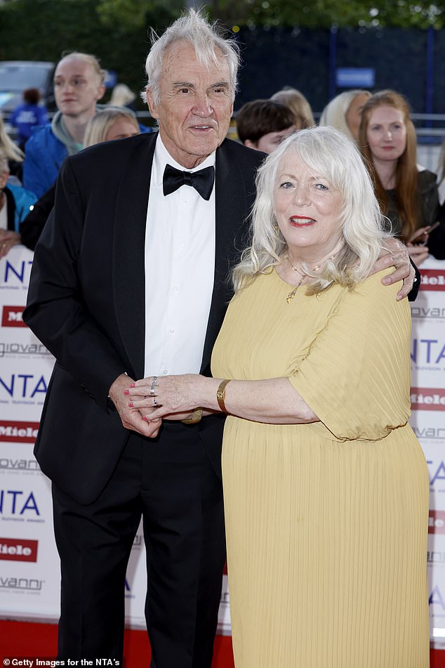 Determined to not be forced into retirement himself he added: 'So no slowing down, just keep going and sending everybody potty' (pictured with Alison Steadman at the NTAs)
