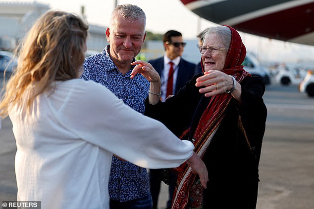 Pictures show the emotional moment the couple were reunited with their daughter Sarah Entwistle, who has tirelessly advocated for her parents' release