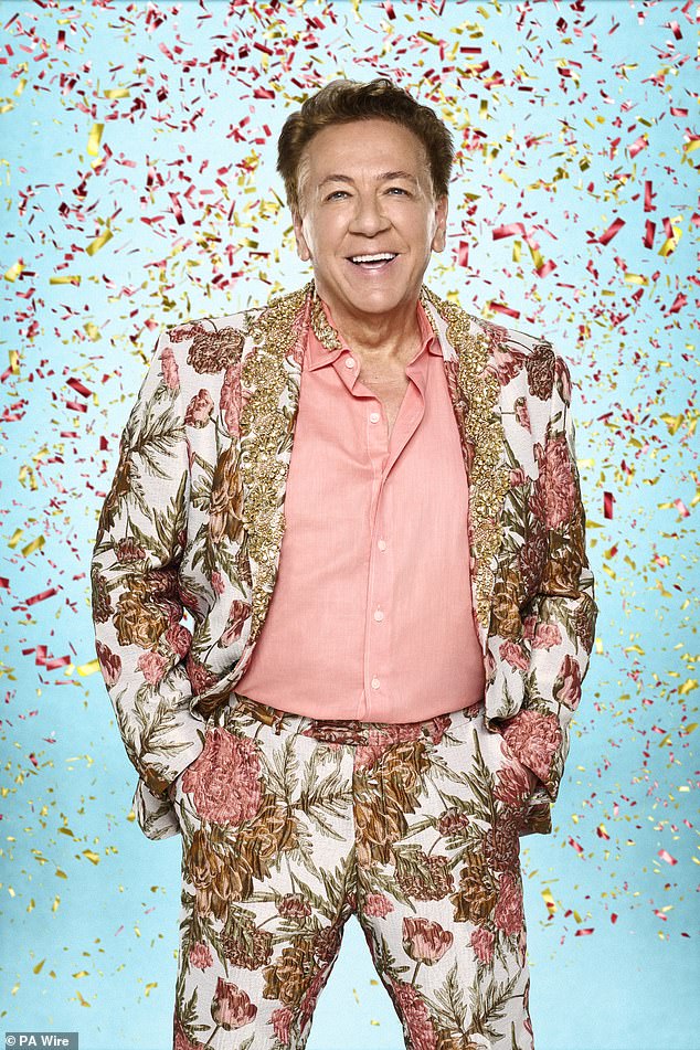 Ross King appeared overjoyed as he swept Jowita Przystał off her feet as he joked: 'You drew the short straw and you drew the short Scottish person' as his dancer was revealed
