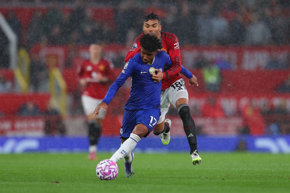 Casemiro of Manchester United fouls Andrey Santos of Chelsea.