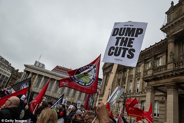 Placards reading 'Dump the Cuts' were held aloft - an apparent reference to supposed £8,000 cuts to some bin workers
