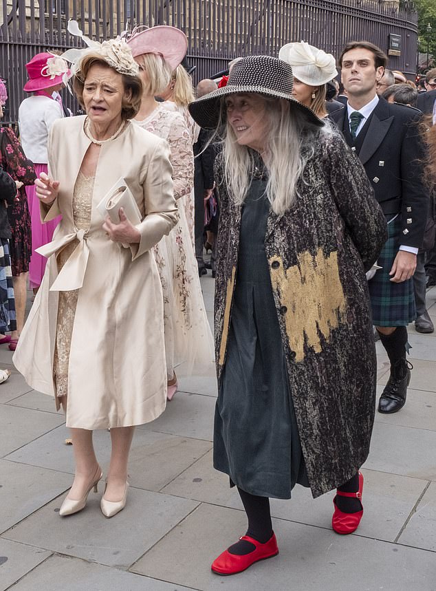 Cherie Blair, wife of former Labour Prime Minister Tony Blair, and TV presenter Mary Beard - wearing very distinctive red footwear - smiled as they made their way into the church