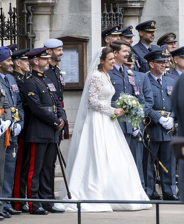Emily Benn with her beau, Group RAF Captain James Niall Doyle, at St Margaret's Church