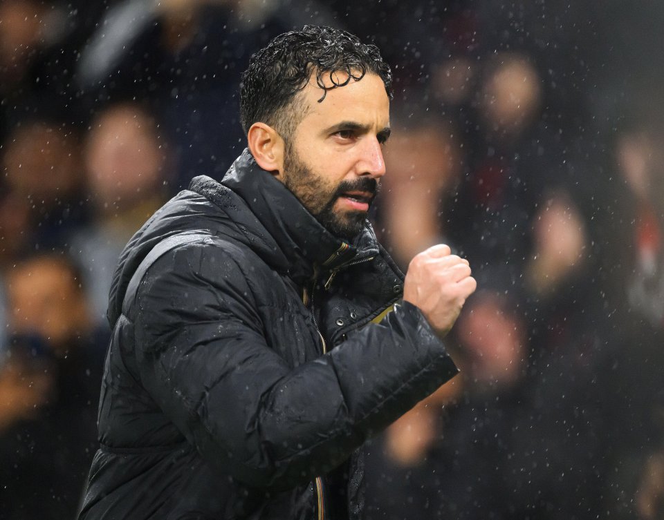 Ruben Amorim celebrates in the rain.