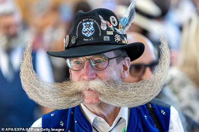 On the nose: Andreas Pelowski from Germany defied gravity with his huge moustache