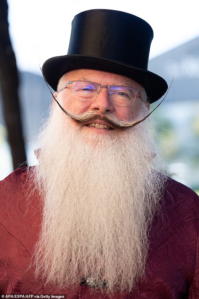 A competitor showed off his long white beard and wide moustache at the championship