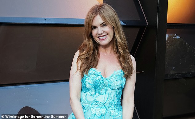 Actress Isla Fisher, spotted on the arm of a handsome man post her split from Sacha Baron Cohen