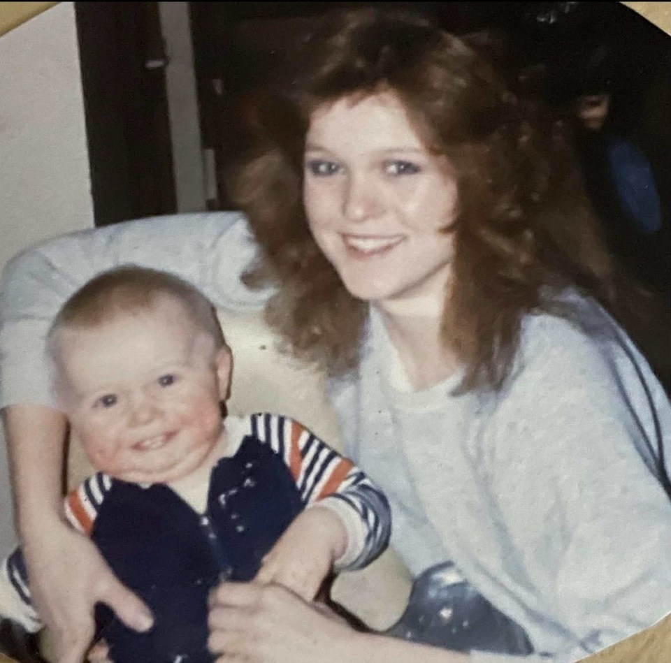 Raylee Reinhart holding her baby, Benjamin Wilcock.