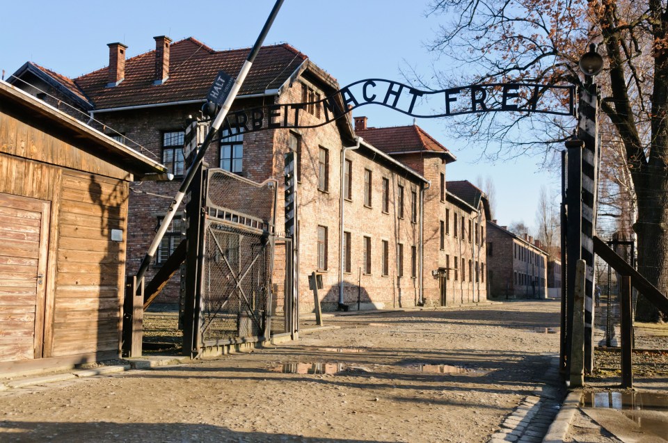 Auschwitz I main entrance with "Arbeit Macht Frei" sign.