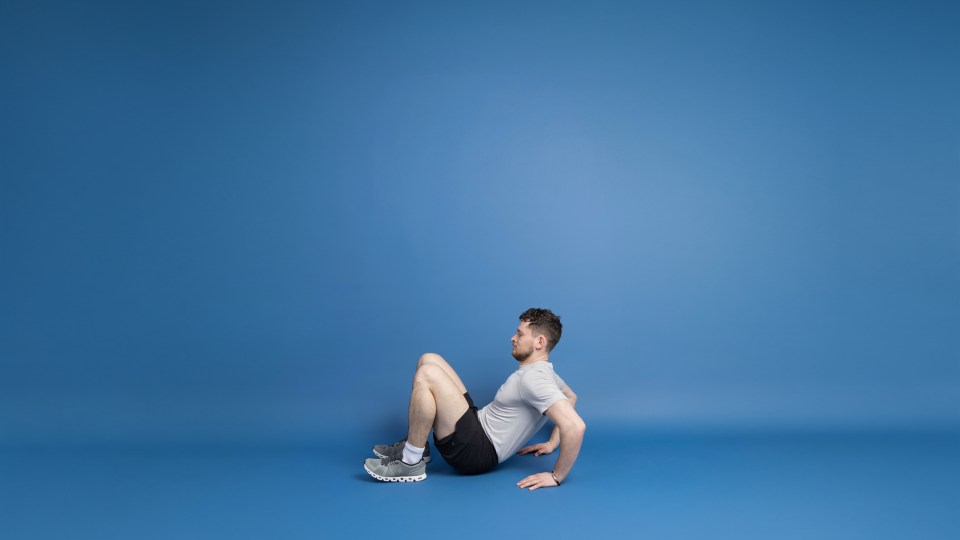 Man doing triceps dips.
