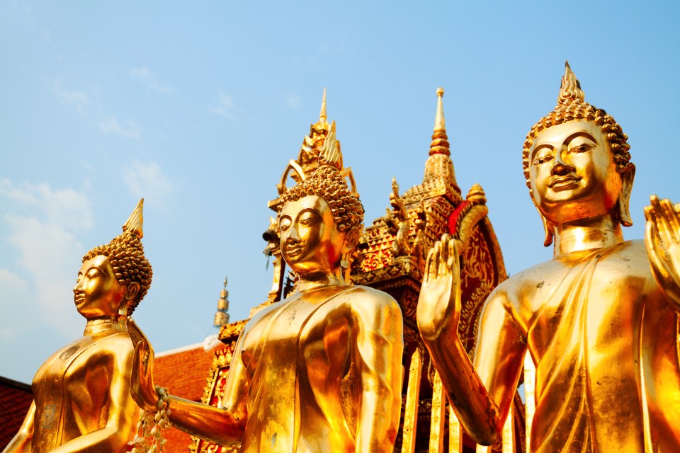 Golden Buddha statues at Doi Suthep temple in Chiang Mai, Thailand.