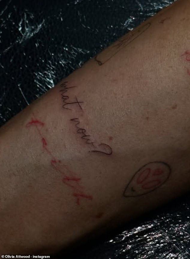 The star shared a series of snaps showing off her fine line inking which reads, 'What now?', just above her right wrist