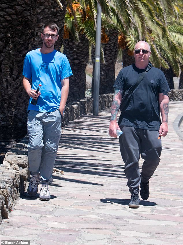 Jay Slater's father Warren (right) and brother Zak (left) both took part in the upcoming documentary about his death. Pictured in Tenerife while looking for Jay last year