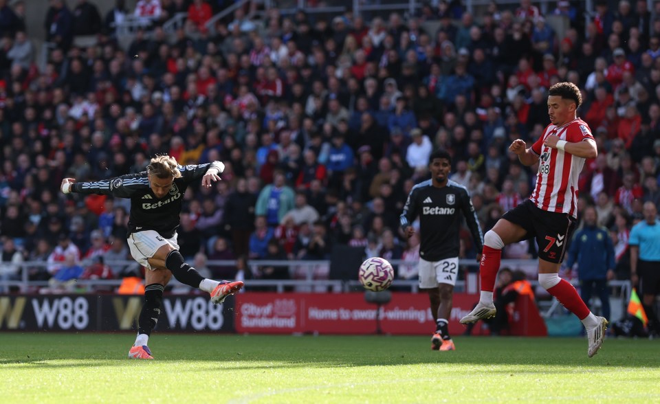 Matty Cash of Aston Villa scores his team's first goal against Sunderland.