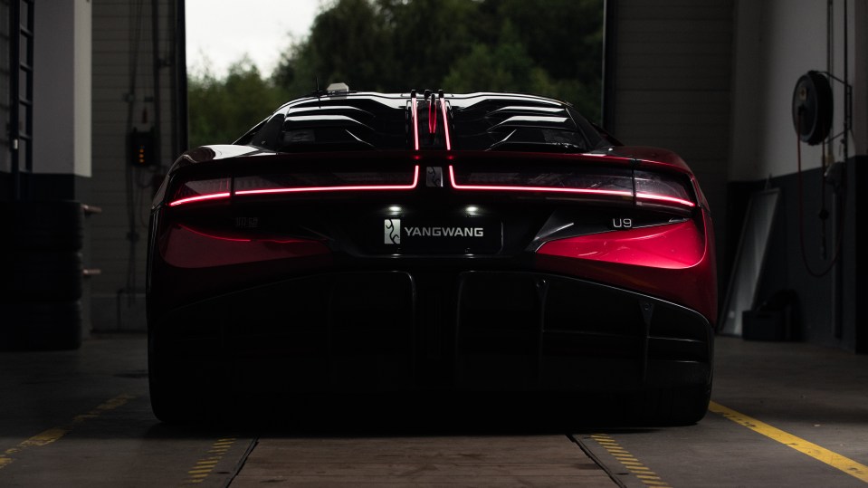 Rear view of a red Yangwang U9 Xtreme production car.